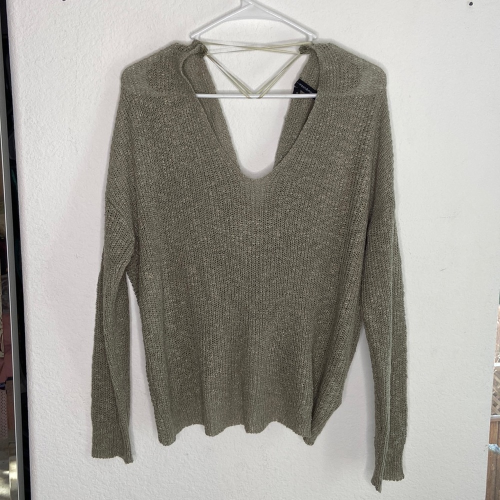 Low cut twist back green sweater, size large